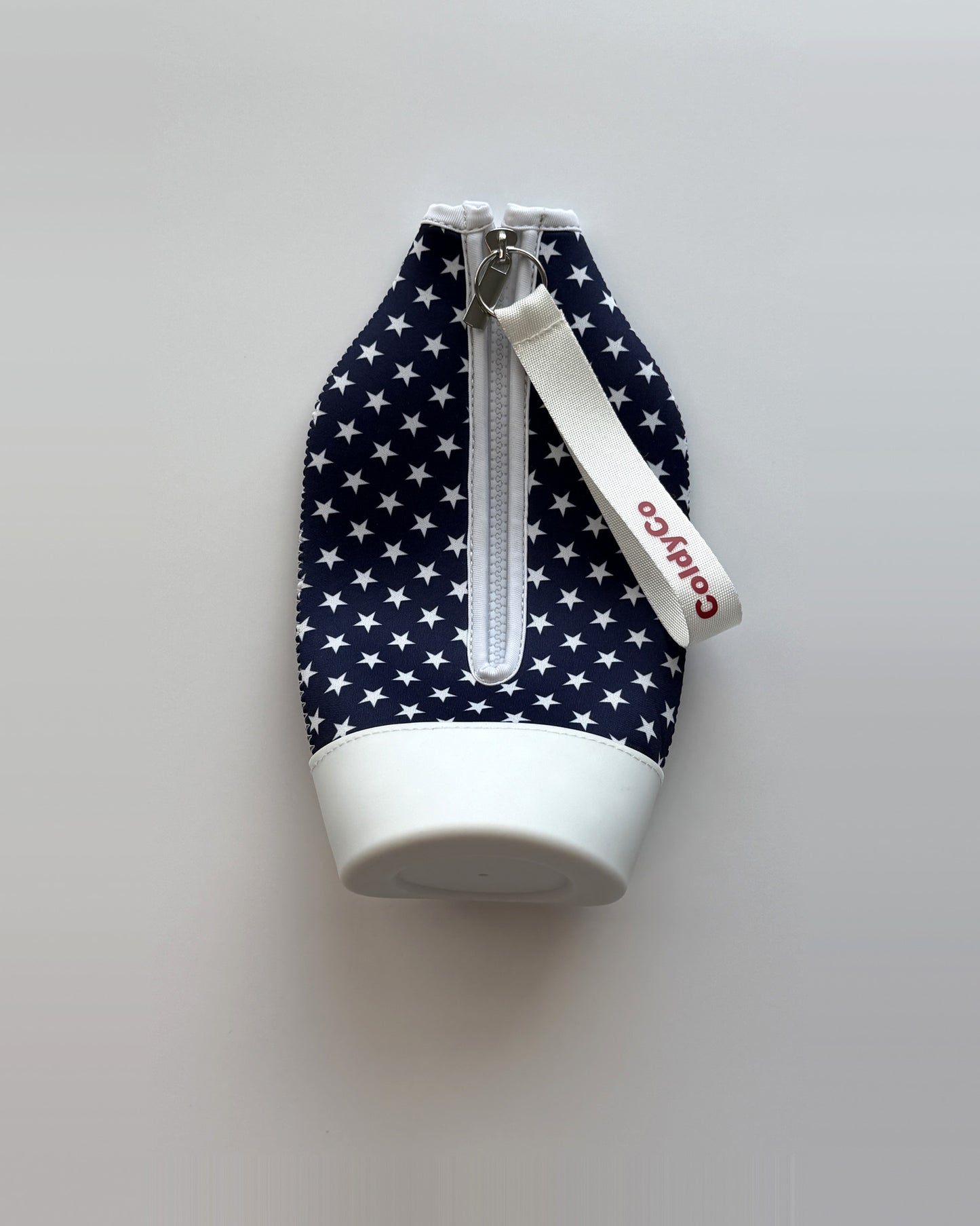 ColdyCo American Flag carrier laid flat, showing the full-length zip and white base