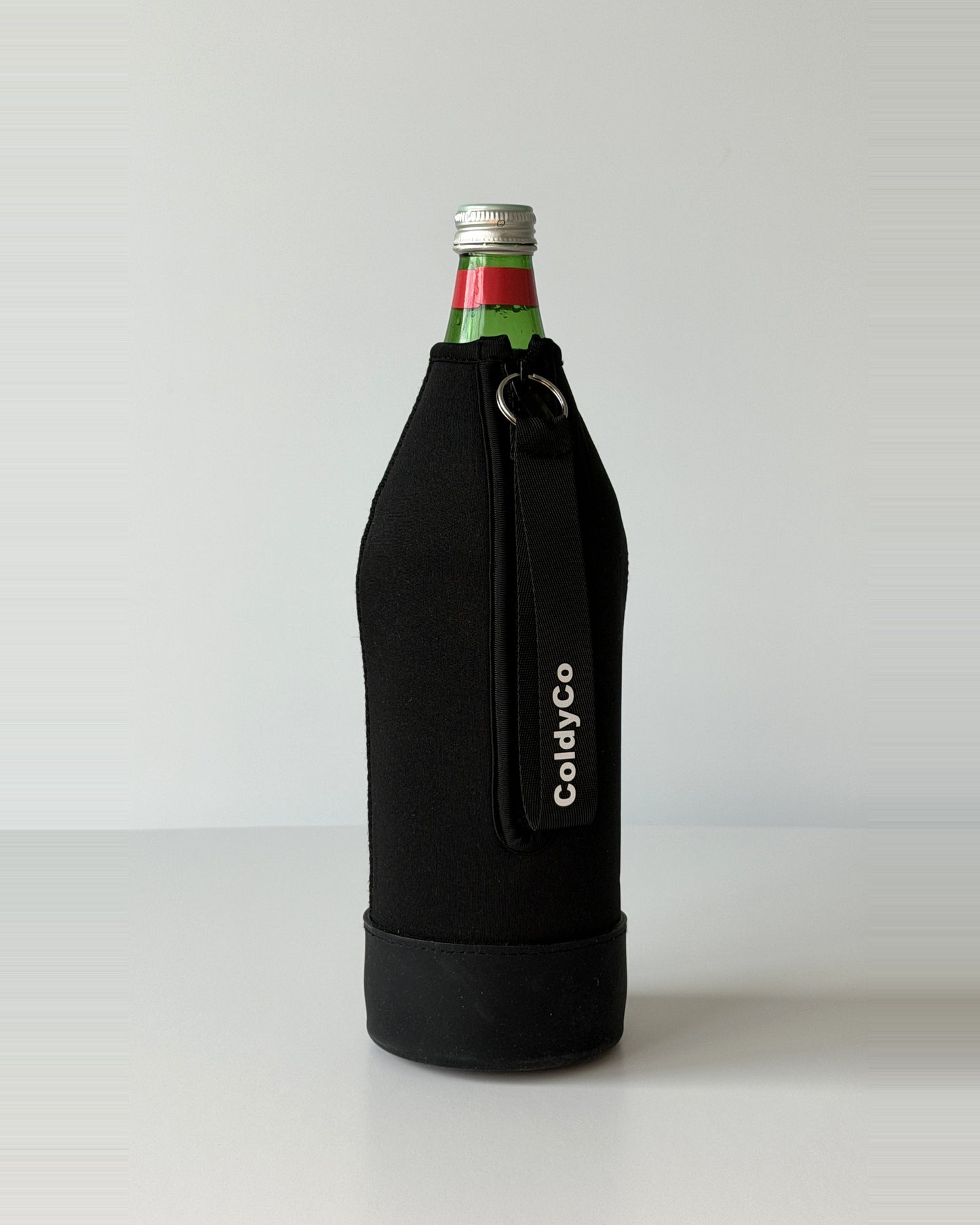 ColdyCo water bottle carrier in Black on a 1-liter glass bottle