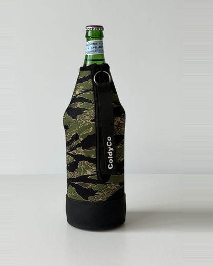 ColdyCo Camo neoprene sleeve with wrist strap on a 1-liter glass bottle