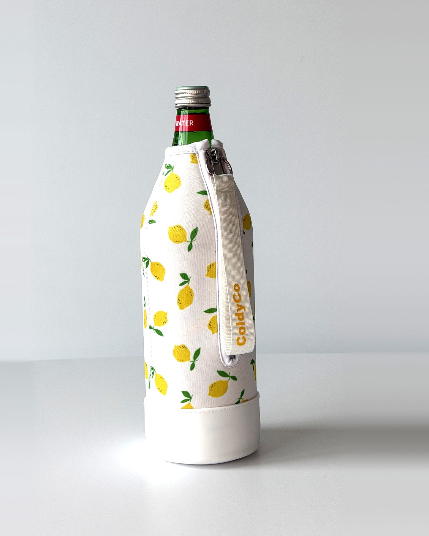 ColdyCo water bottle carrier in Lemon Print on a 1-liter glass bottle