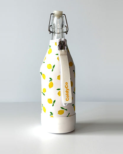 ColdyCo Lemon Print bottle carrier holding a swing-top glass bottle, side view