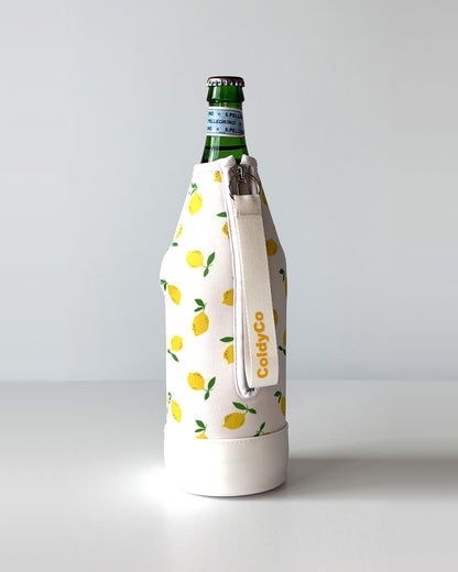 ColdyCo Lemon Print neoprene sleeve with wrist strap on a 1-liter glass bottle