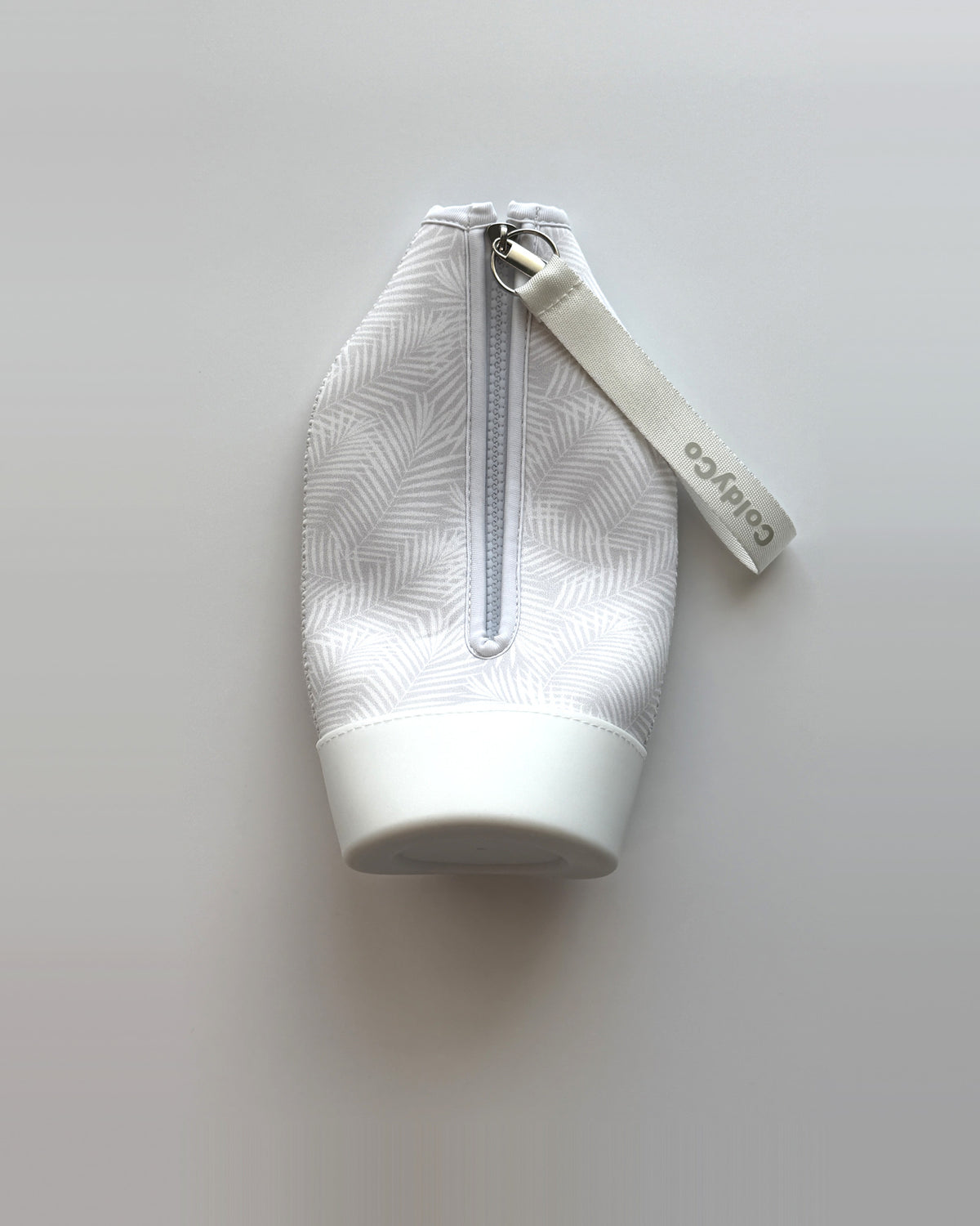 ColdyCo Palm Print carrier laid flat, showing the full-length zip and white base