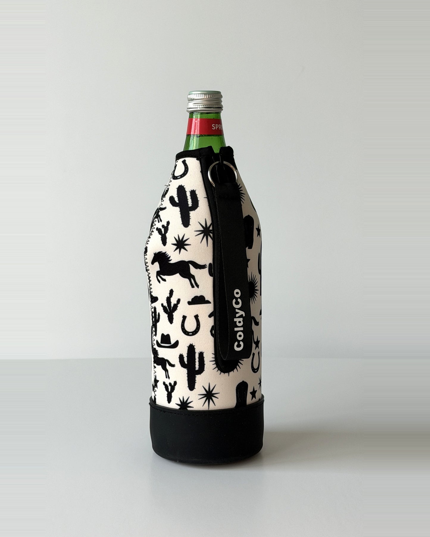ColdyCo water bottle carrier in Western Print on a 1-liter glass bottle